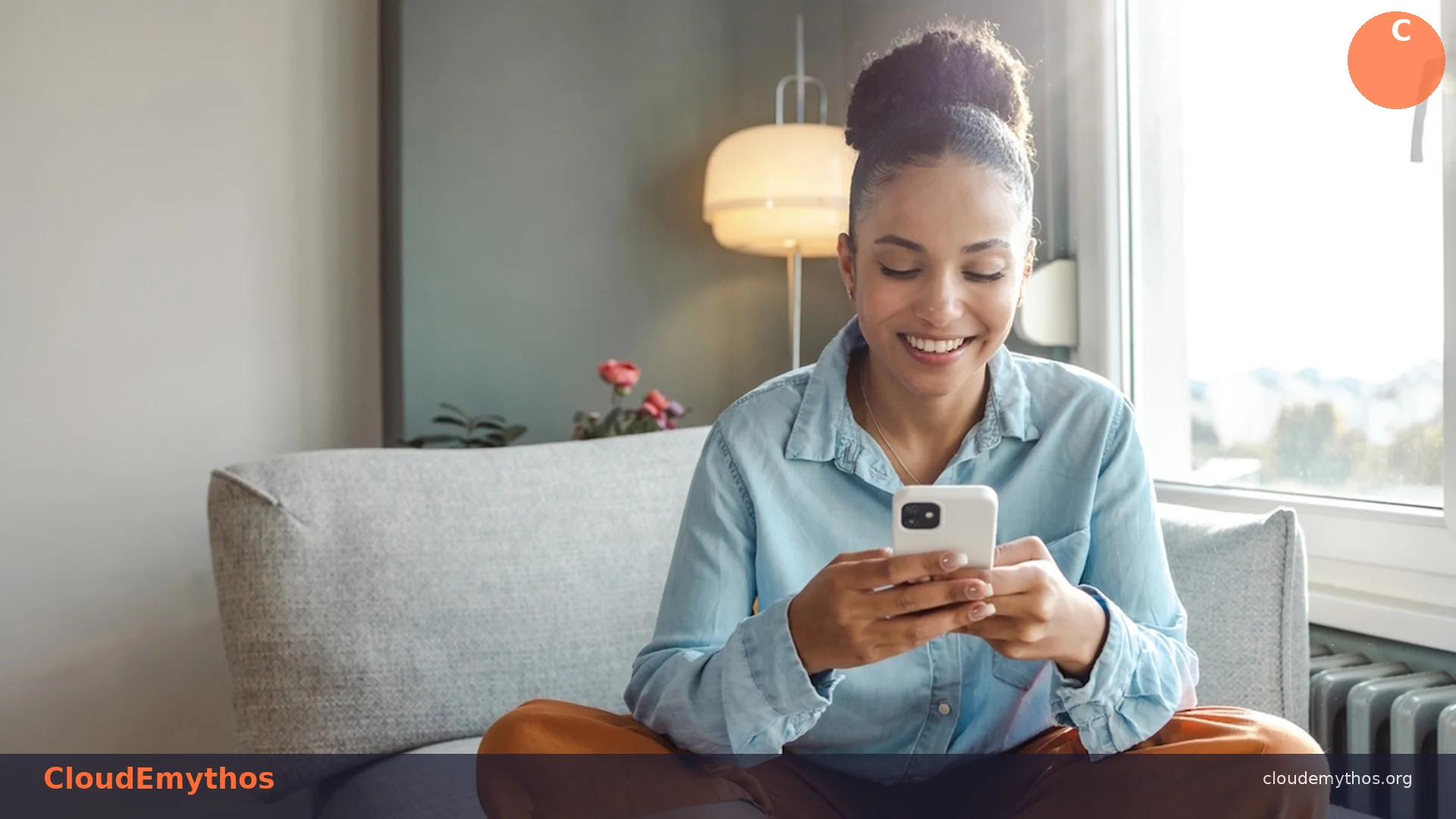 A woman using a smartphone at home, illustrating ChatGPT ad targeting and privacy